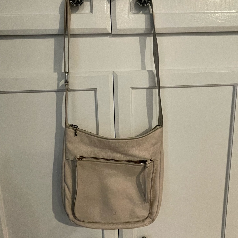 the sak- crossbody bag - approx 11x11 - cream - good condition